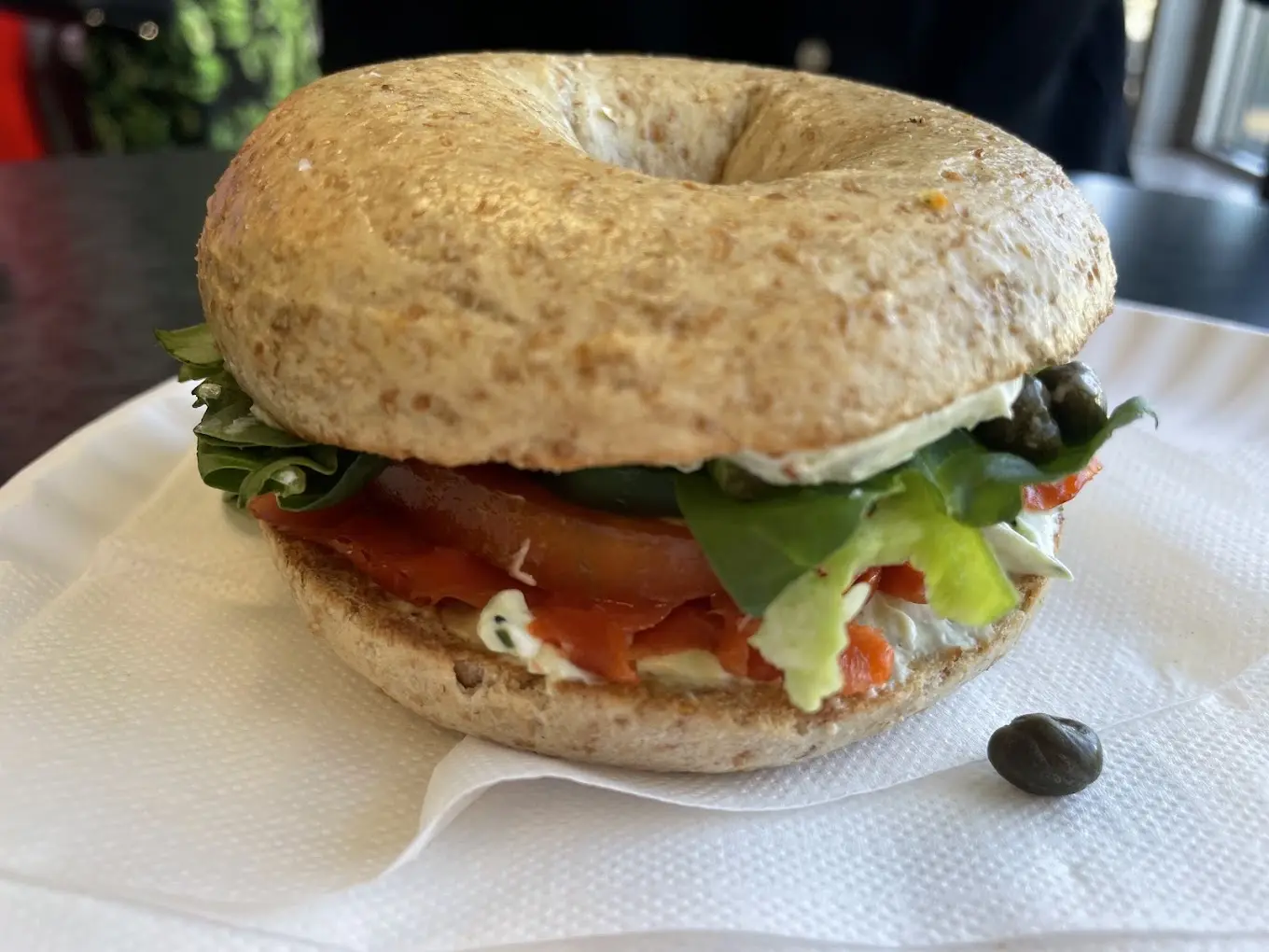 Lox sandwich on a whole wheat bagel