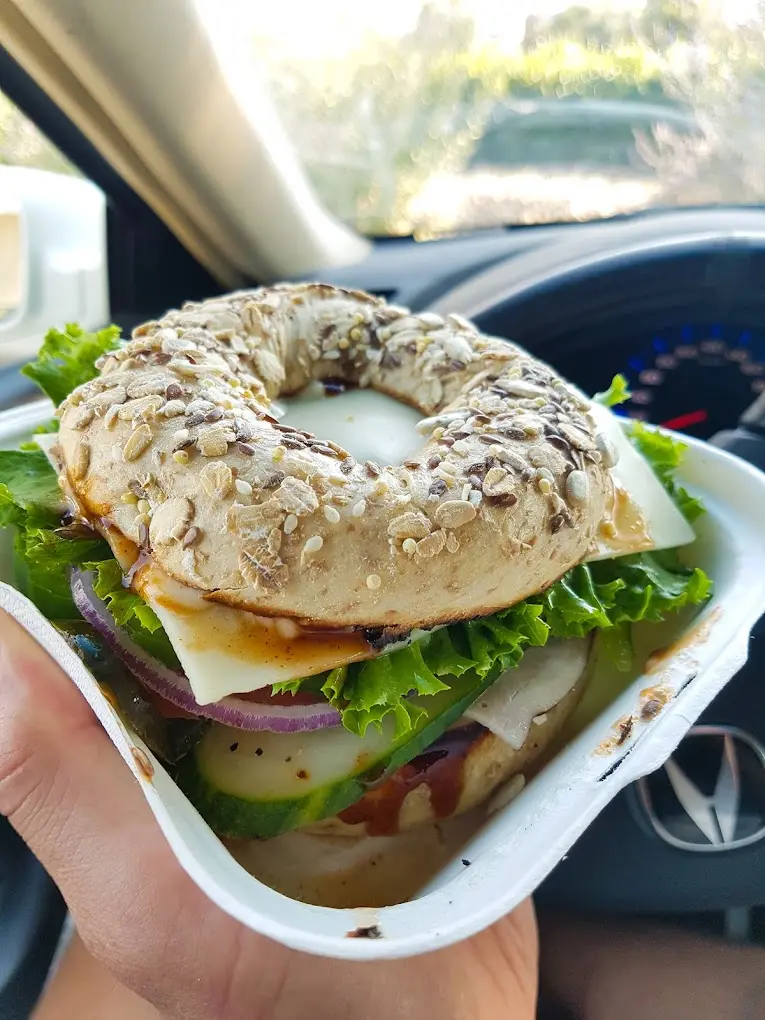 Royal Veggie bagel sandwich with cream cheese and fresh vegetables